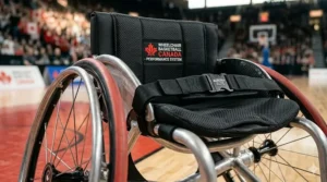 A player executing a sharp turn using the best basketball wheelchair in a competitive match.